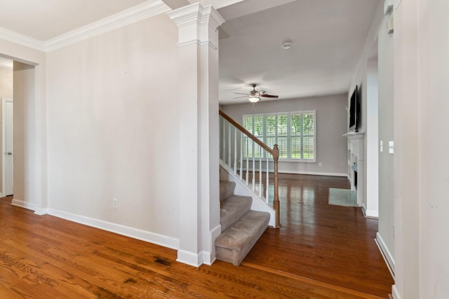3045 Cairns Dr W, Mount Juliet, TN 37122 - stairs featuring a ceiling fan, baseboards, wood finished floors, decorative columns, and a fireplace with flush hearth