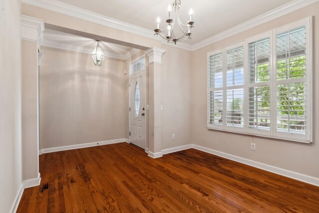 3045 Cairns Dr W, Mount Juliet, TN 37122 - empty room with a chandelier, dark wood finished floors, baseboards, and ornamental molding