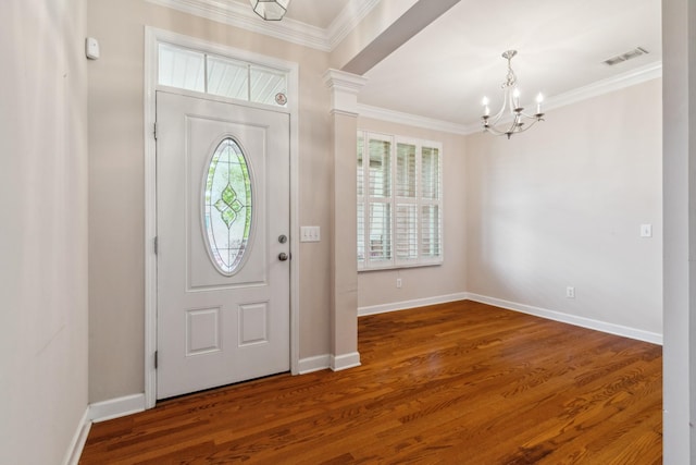 3045 Cairns Dr W, Mount Juliet, TN 37122 - foyer featuring a chandelier, ornamental molding, wood finished floors, baseboards, and ornate columns