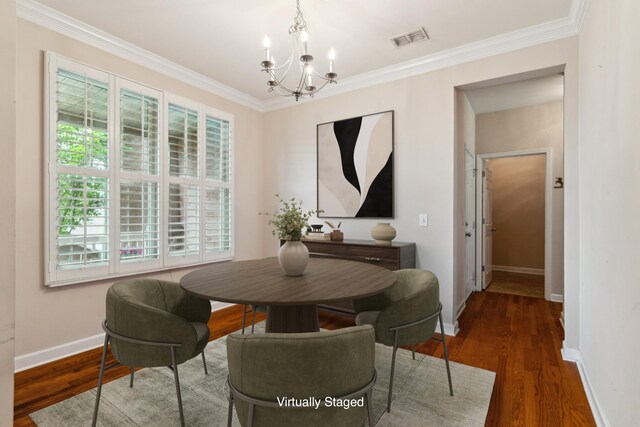 3045 Cairns Dr W, Mount Juliet, TN 37122 - dining area with a chandelier, baseboards, crown molding, and wood finished floors