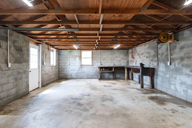below grade area with concrete block wall