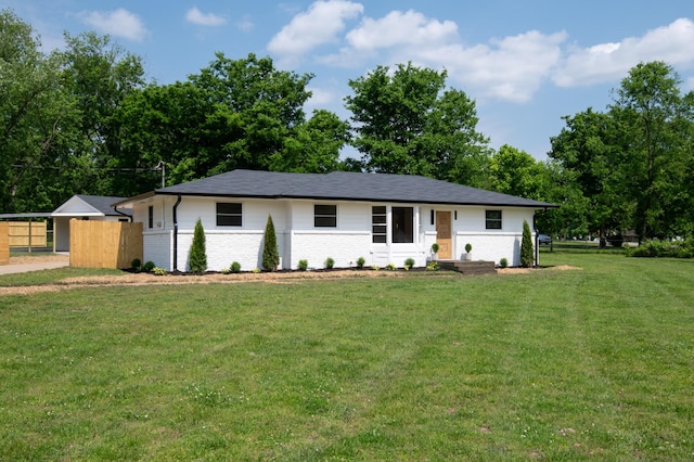 single story home with brick siding