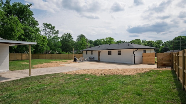 back of property with a patio area