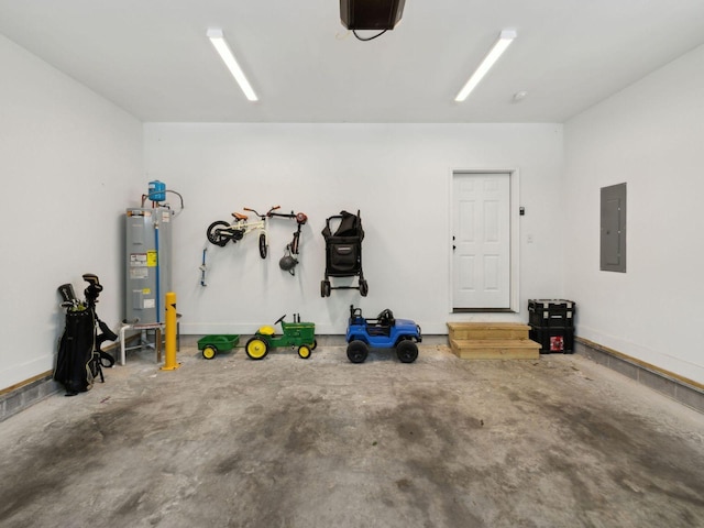 garage featuring electric panel, electric water heater, and a garage door opener
