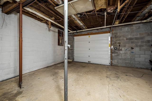 124 Tom Link Rd, Cottontown, TN 37048 - garage featuring electric panel and concrete block wall