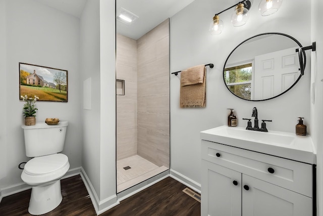 124 Tom Link Rd, Cottontown, TN 37048 - full bath with toilet, baseboards, wood finished floors, and tiled shower