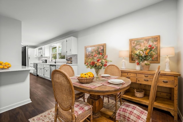124 Tom Link Rd, Cottontown, TN 37048 - dining space with dark wood-style floors