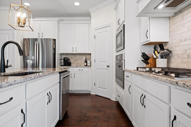 3983 Inlet Loop, Chattanooga, TN 37416 - kitchen featuring extractor fan, stainless steel appliances, decorative backsplash, a chandelier, and a sink