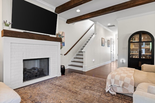 3983 Inlet Loop, Chattanooga, TN 37416 - living area with stairs, wood finished floors, crown molding, beam ceiling, and recessed lighting