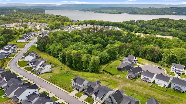 3983 Inlet Loop, Chattanooga, TN 37416 - aerial perspective of suburban area with a nearby body of water and a heavily wooded area