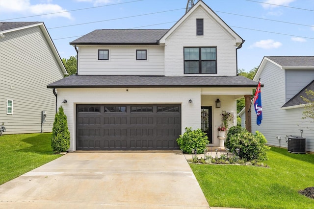3983 Inlet Loop, Chattanooga, TN 37416 - view of front of house featuring an attached garage, a front lawn, roof with shingles, and central AC unit