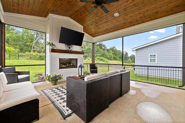 3983 Inlet Loop, Chattanooga, TN 37416 - sunroom / solarium with an outdoor living space with a fireplace, ceiling fan, plenty of natural light, and vaulted ceiling