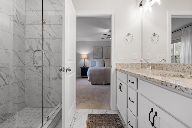 3983 Inlet Loop, Chattanooga, TN 37416 - ensuite bathroom featuring a shower stall, double vanity, marble finish floors, baseboards, and ceiling fan
