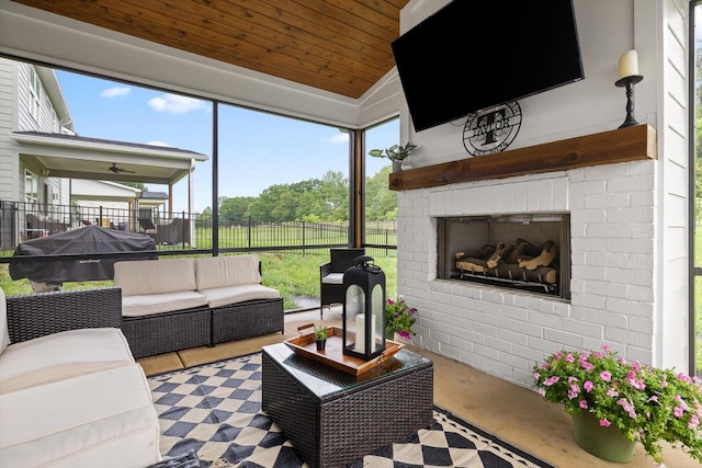 3983 Inlet Loop, Chattanooga, TN 37416 - sunroom with an outdoor living space with a fireplace, lofted ceiling, and plenty of natural light