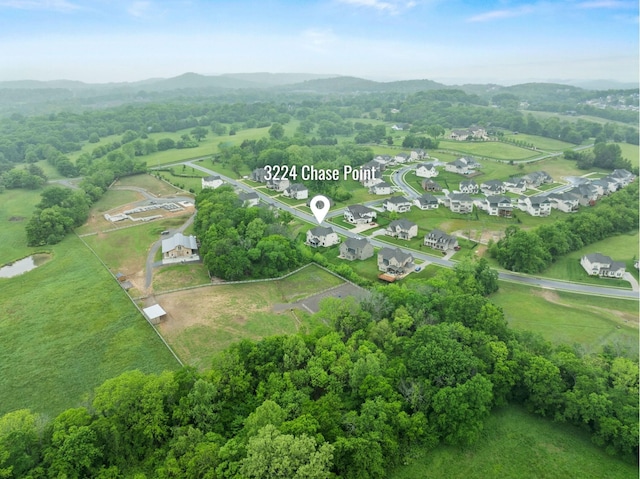 3224 Chase Point Dr, Franklin, TN 37067 - aerial view of property and surrounding area with property parcel outlined and a mountain backdrop