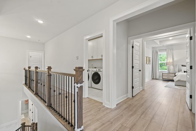 3224 Chase Point Dr, Franklin, TN 37067 - corridor with washer / clothes dryer, light wood finished floors, an upstairs landing, baseboards, and recessed lighting