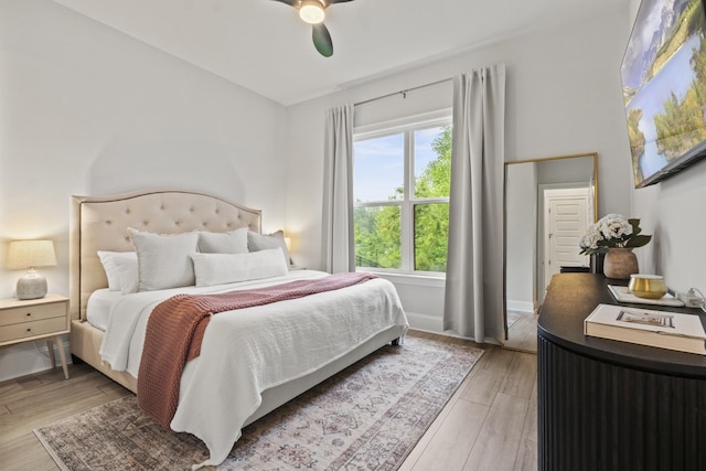 3224 Chase Point Dr, Franklin, TN 37067 - bedroom featuring light wood-style flooring, ceiling fan, and baseboards