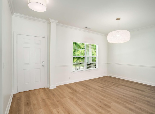 3038 Oxford Glen Dr, Franklin, TN 37067 - empty room featuring light wood-style flooring, crown molding, and baseboards