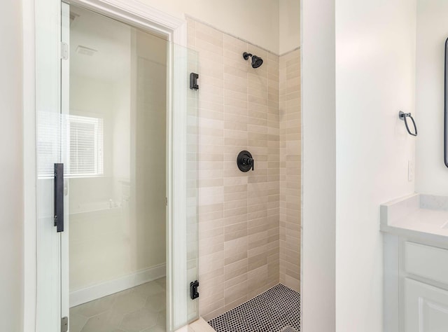 3038 Oxford Glen Dr, Franklin, TN 37067 - full bathroom featuring a shower stall, vanity, and tile patterned floors