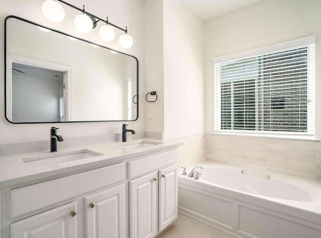 3038 Oxford Glen Dr, Franklin, TN 37067 - bathroom featuring a garden tub and double vanity
