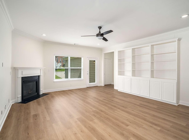 3038 Oxford Glen Dr, Franklin, TN 37067 - unfurnished living room with ornamental molding, a ceiling fan, light wood-style flooring, baseboards, and a fireplace with flush hearth