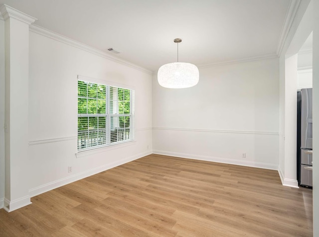 3038 Oxford Glen Dr, Franklin, TN 37067 - unfurnished room with crown molding, light wood-style flooring, and baseboards