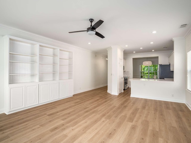 3038 Oxford Glen Dr, Franklin, TN 37067 - unfurnished living room with a ceiling fan, crown molding, light wood finished floors, recessed lighting, and baseboards