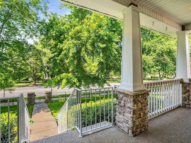 3038 Oxford Glen Dr, Franklin, TN 37067 - view of patio / terrace with covered porch and view of scattered trees