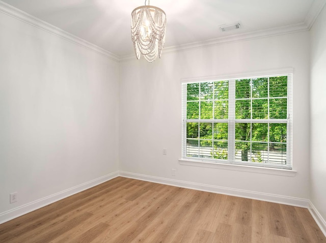 3038 Oxford Glen Dr, Franklin, TN 37067 - empty room featuring a chandelier, light wood-type flooring, baseboards, and crown molding