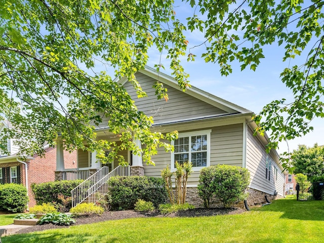 3038 Oxford Glen Dr, Franklin, TN 37067 - view of front of house featuring a front yard and stone siding