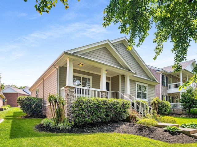 3038 Oxford Glen Dr, Franklin, TN 37067 - view of front of property with covered porch and a front lawn