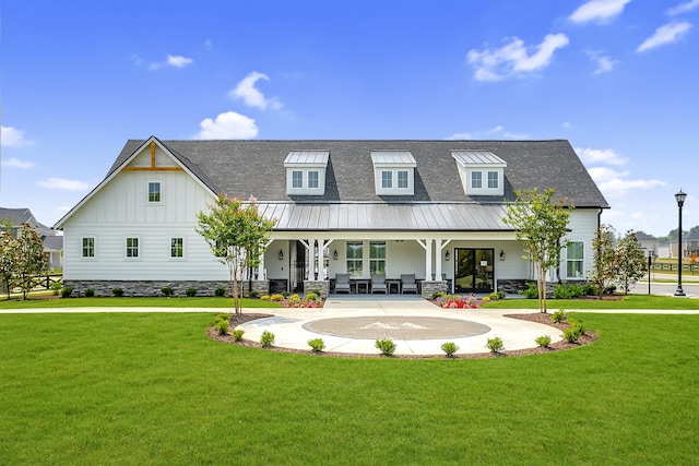949 Pleasant Ridge Run, Mount Juliet, TN 37122 - view of front of property with a porch, a front yard, board and batten siding, and roof with shingles