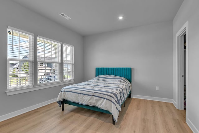 1610 Shenstone Dr, Smyrna, TN 37167 - bedroom with baseboards, wood finished floors, and recessed lighting