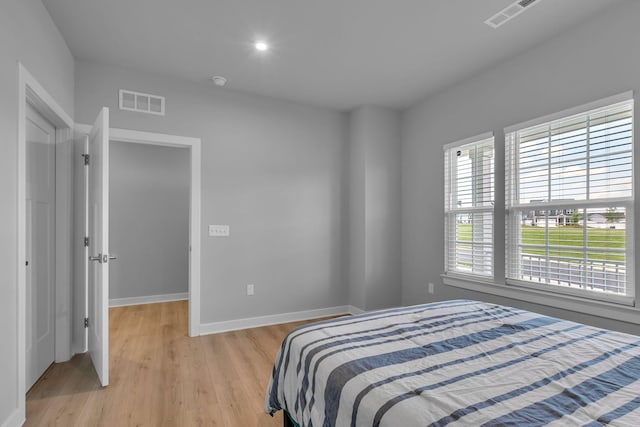 1610 Shenstone Dr, Smyrna, TN 37167 - bedroom featuring baseboards, light wood-type flooring, and recessed lighting