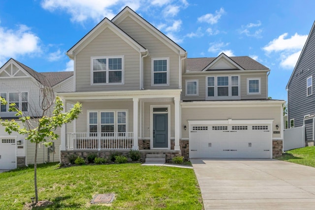 1610 Shenstone Dr, Smyrna, TN 37167 - craftsman-style house with a porch, a garage, stone siding, concrete driveway, and a front yard