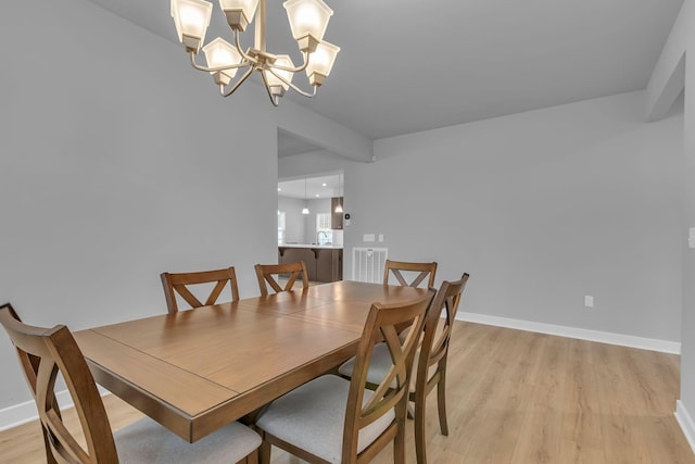 1610 Shenstone Dr, Smyrna, TN 37167 - dining area featuring light wood-style flooring, a chandelier, and baseboards