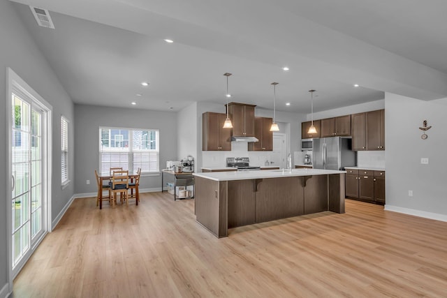 1610 Shenstone Dr, Smyrna, TN 37167 - kitchen with appliances with stainless steel finishes, light wood-style floors, baseboards, light countertops, and recessed lighting
