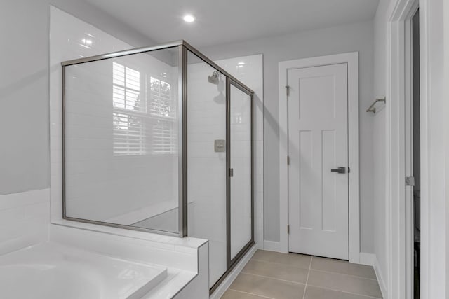 1610 Shenstone Dr, Smyrna, TN 37167 - full bath featuring a shower stall, tile patterned floors, and a garden tub