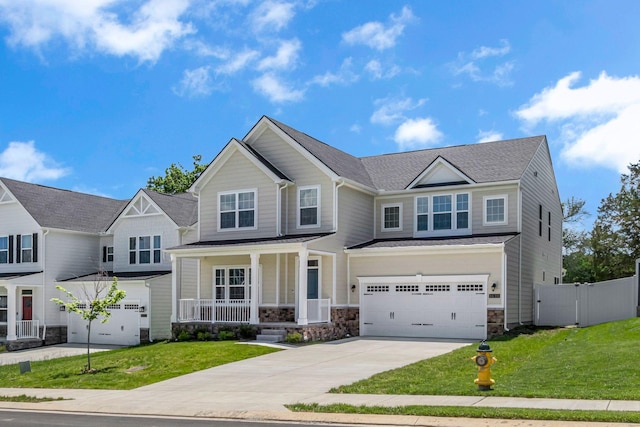 1610 Shenstone Dr, Smyrna, TN 37167 - craftsman-style house featuring a porch, concrete driveway, an attached garage, and stone siding