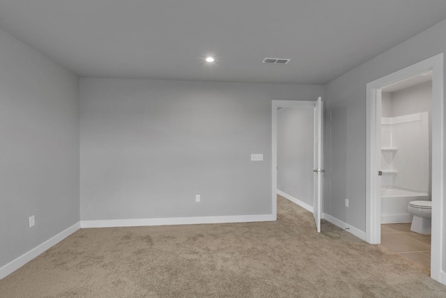 1610 Shenstone Dr, Smyrna, TN 37167 - unfurnished bedroom with carpet floors, baseboards, recessed lighting, and ensuite bath