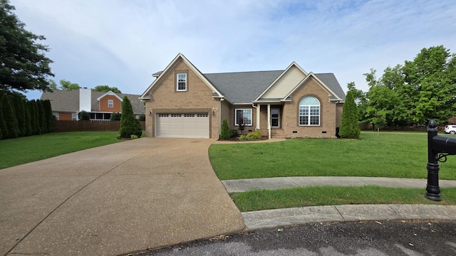 109 Coteswood Ct, Columbia, TN 38401 - view of front facade featuring a garage, concrete driveway, a front yard, and brick siding
