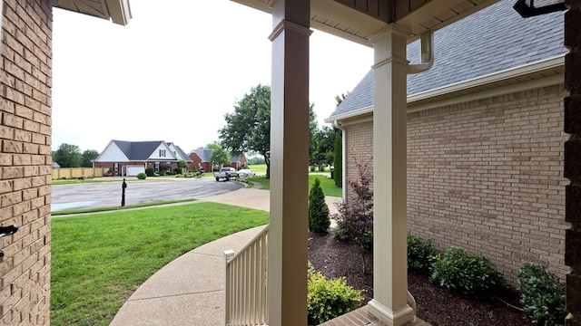 109 Coteswood Ct, Columbia, TN 38401 - view of green lawn featuring a porch and a residential view