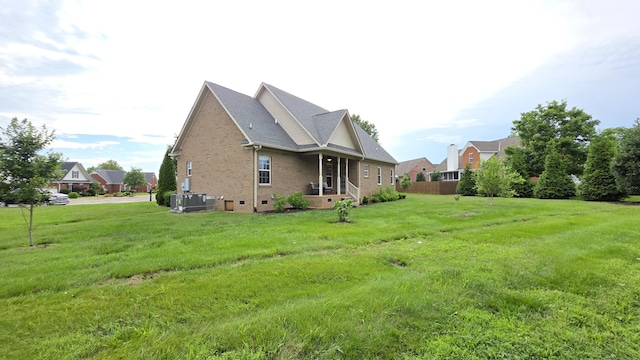 109 Coteswood Ct, Columbia, TN 38401 - view of home's exterior featuring brick siding, cooling unit, and a lawn