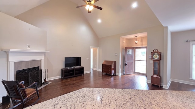 109 Coteswood Ct, Columbia, TN 38401 - living area with dark wood-type flooring, a fireplace with flush hearth, plenty of natural light, ceiling fan, and high vaulted ceiling