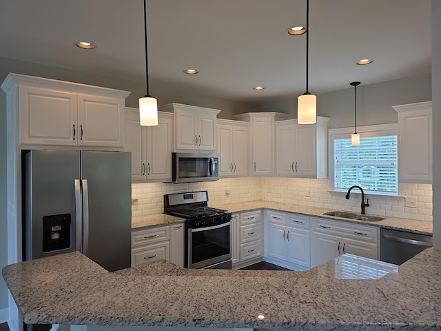 109 Coteswood Ct, Columbia, TN 38401 - kitchen with stainless steel appliances, a sink, white cabinetry, and recessed lighting