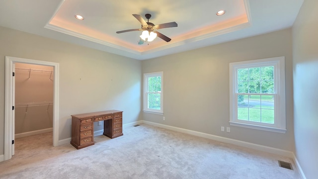 109 Coteswood Ct, Columbia, TN 38401 - unfurnished bedroom with a raised ceiling, recessed lighting, light carpet, a spacious closet, and baseboards