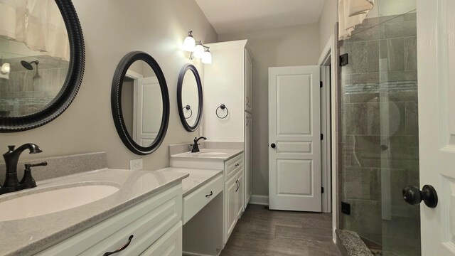109 Coteswood Ct, Columbia, TN 38401 - full bath with two vanities, a stall shower, and wood finished floors