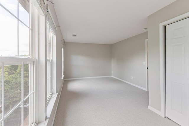 664 Huffine Manor Cir, Franklin, TN 37067 - unfurnished room with light colored carpet and baseboards