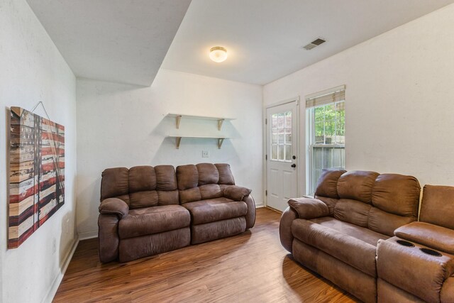 664 Huffine Manor Cir, Franklin, TN 37067 - living area featuring wood finished floors and baseboards
