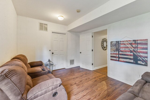664 Huffine Manor Cir, Franklin, TN 37067 - living area with wood finished floors and baseboards